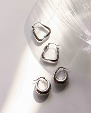 Oculus Silver Earrings